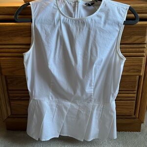 Theory - white peplum top with back zipped closure